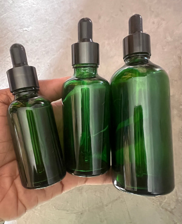 Green dropper bottles